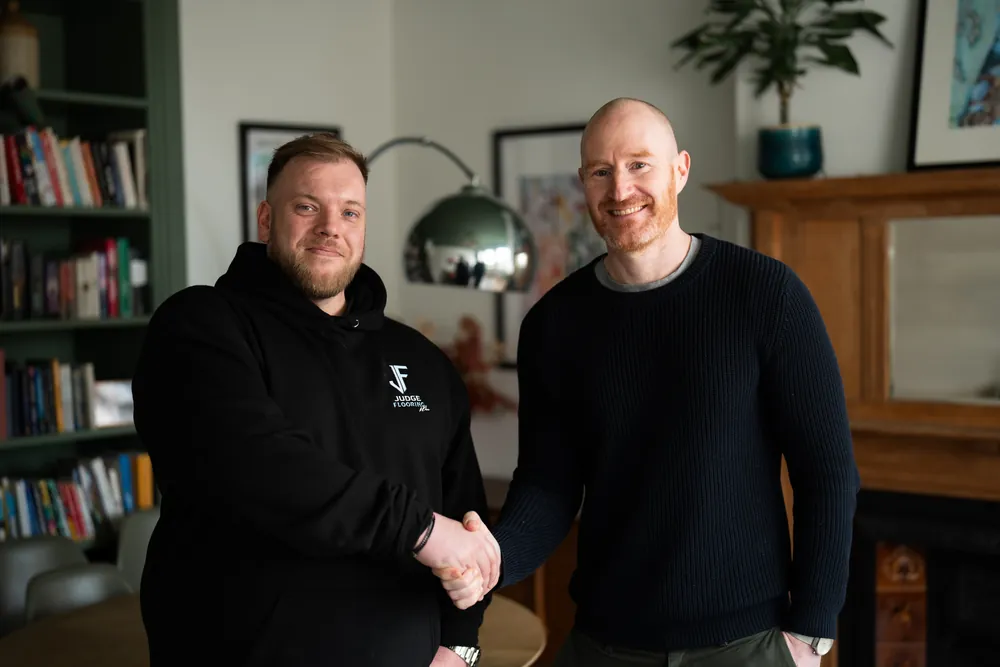 Steve with Dan in his finished lounge in Eastbourne