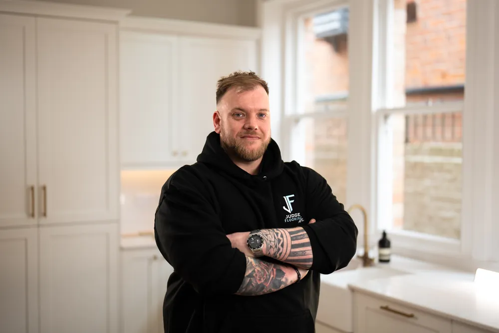Steve, owner of Judge Flooring, in a finished kitchen